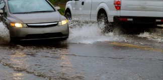 A Sign Of Hope On Stormy Streets: Driver Inspires With Free Rides For Patients